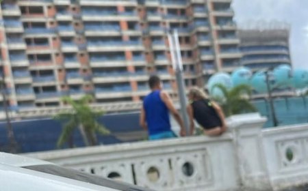 Mulher faz cocô em mureta de praia no litoral de São Paulo