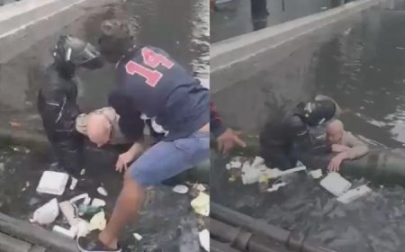 Vídeo: idoso cai em canal durante fortes chuvas e alagamentos em Santos