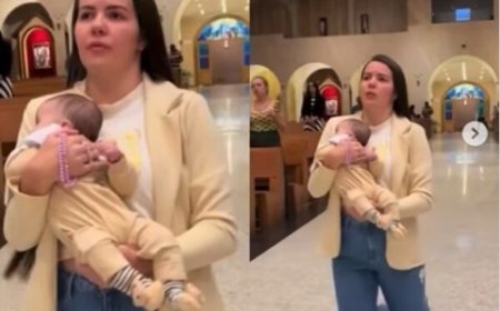 Com filho no colo, mãe viraliza ao cumprir promessa em igreja; veja vídeo