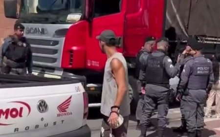 Mulher tenta fugir com caminhoneiro e marido pendura na janela