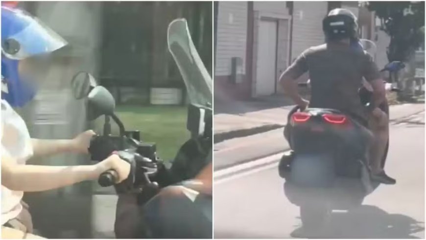 Criança é flagrada pilotando motocicleta com adulto na garupa